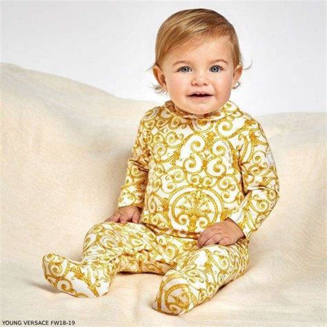 young versace gold baroque babygrow|Versace kids shoes.